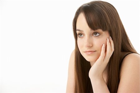 simsearch:400-06104816,k - Studio Portrait Of Teenage Girl On White Background Stock Photo - Budget Royalty-Free & Subscription, Code: 400-05734865