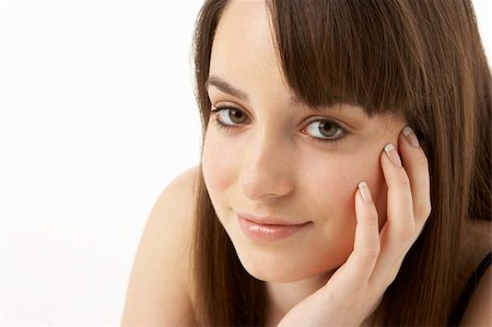 simsearch:400-06104816,k - Studio Portrait Of Teenage Girl On White Background Stock Photo - Budget Royalty-Free & Subscription, Code: 400-05734863