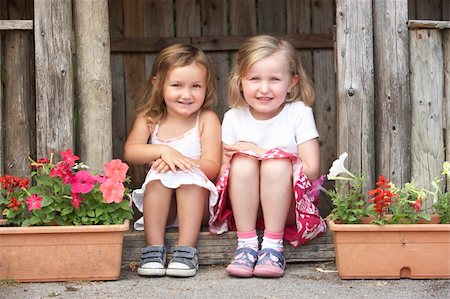 pictures of kids and friends playing at school - Two Young Girls Playing in Wooden House Stock Photo - Budget Royalty-Free & Subscription, Code: 400-05735252
