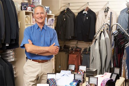 fashion and retail salesman - Male sales assistant in clothing store Stock Photo - Budget Royalty-Free & Subscription, Code: 400-05735339