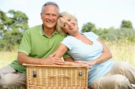 simsearch:400-05735475,k - Mature couple having picnic in countryside Stock Photo - Budget Royalty-Free & Subscription, Code: 400-05735458