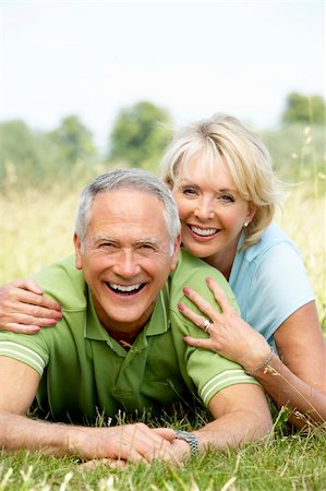 simsearch:400-05735475,k - Mature couple having fun in countryside Stock Photo - Budget Royalty-Free & Subscription, Code: 400-05735464