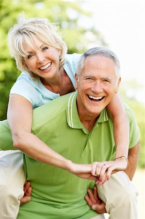 simsearch:400-05735475,k - Mature couple having fun in countryside Stock Photo - Budget Royalty-Free & Subscription, Code: 400-05735474