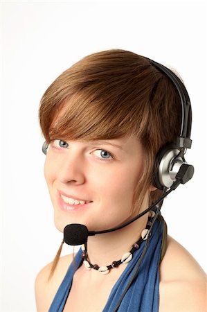 simsearch:400-08647874,k - young woman with a headset smilling Photographie de stock - Aubaine LD & Abonnement, Code: 400-05735739