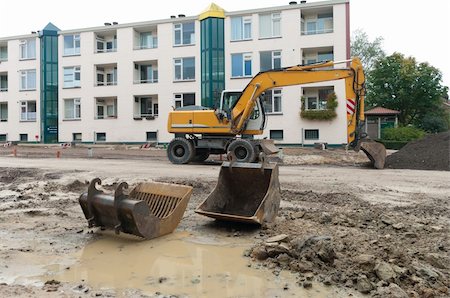 excavator on a construction site Stock Photo - Budget Royalty-Free & Subscription, Code: 400-05735885