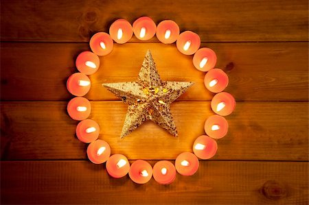 christmas candles circle over wood and golden star symbol Stock Photo - Budget Royalty-Free & Subscription, Code: 400-05735988