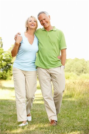 simsearch:400-05735475,k - Mature couple walking in countryside Stock Photo - Budget Royalty-Free & Subscription, Code: 400-05736034