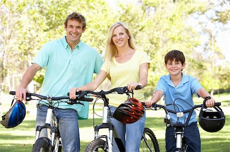 simsearch:400-04402100,k - Parents And Son On Cycle Ride In Park Stock Photo - Budget Royalty-Free & Subscription, Code: 400-05736142