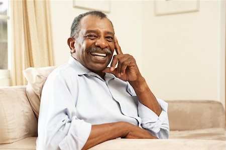 simsearch:400-05736257,k - Senior Man Relaxing In Chair At Home Stock Photo - Budget Royalty-Free & Subscription, Code: 400-05736268