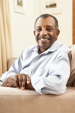 simsearch:400-05736257,k - Senior Man Relaxing In Chair At Home Stock Photo - Budget Royalty-Free & Subscription, Code: 400-05736260