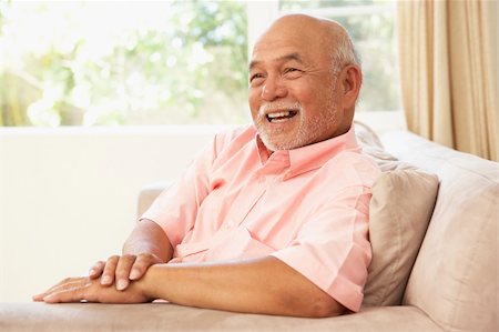 simsearch:400-04026722,k - Senior Man Relaxing In Chair At Home Stock Photo - Budget Royalty-Free & Subscription, Code: 400-05736458