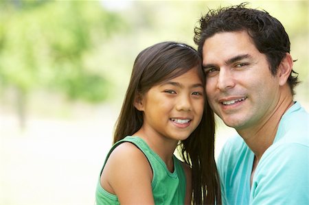 simsearch:400-05736759,k - Father And Daughter In Park Stock Photo - Budget Royalty-Free & Subscription, Code: 400-05736762