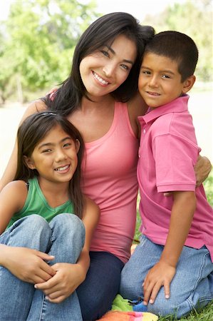 simsearch:400-05736759,k - Mother And Children In Park Stock Photo - Budget Royalty-Free & Subscription, Code: 400-05736779