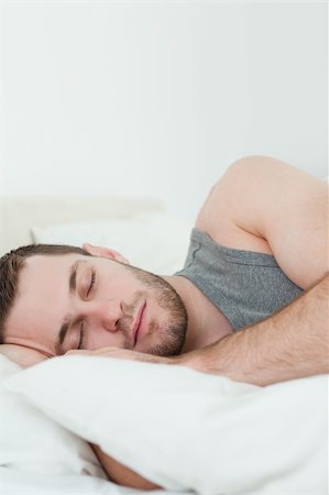 simsearch:400-08299475,k - Portrait of a man sleeping in his bedroom Stock Photo - Budget Royalty-Free & Subscription, Code: 400-05737244