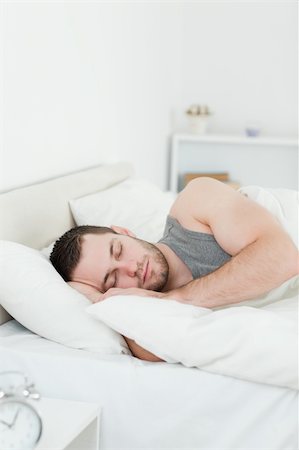 simsearch:400-08299475,k - Portrait of a young man sleeping in his bedroom Stock Photo - Budget Royalty-Free & Subscription, Code: 400-05737247