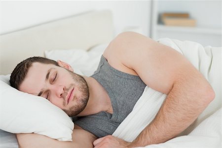 simsearch:400-08299475,k - Handsome man sleeping in his bedroom Stock Photo - Budget Royalty-Free & Subscription, Code: 400-05737248