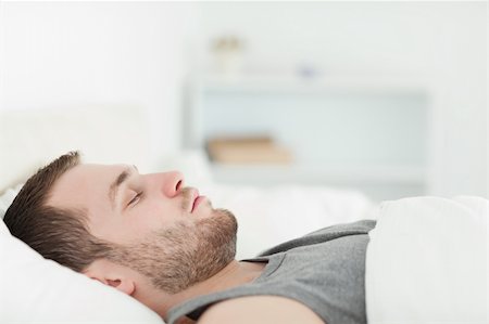 simsearch:400-08299475,k - Quiet man sleeping in his bedroom Stock Photo - Budget Royalty-Free & Subscription, Code: 400-05737251