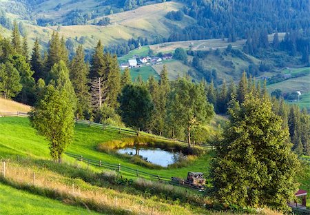 simsearch:400-05737744,k - Small pool on summer mountain farmland on hill slope Stock Photo - Budget Royalty-Free & Subscription, Code: 400-05737760
