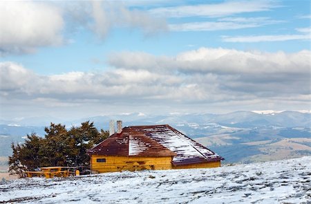 Wooden house on october Carpathian mountain plateau with first winter snow Stock Photo - Budget Royalty-Free & Subscription, Code: 400-05737763
