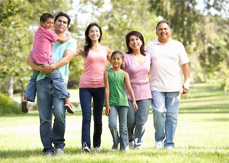 simsearch:400-05736759,k - Extended Family Group Walking In Park Stock Photo - Budget Royalty-Free & Subscription, Code: 400-05737839