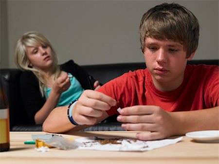 smoking teen boys - Teenage Couple Taking Drugs At Home Stock Photo - Budget Royalty-Free & Subscription, Code: 400-05737912