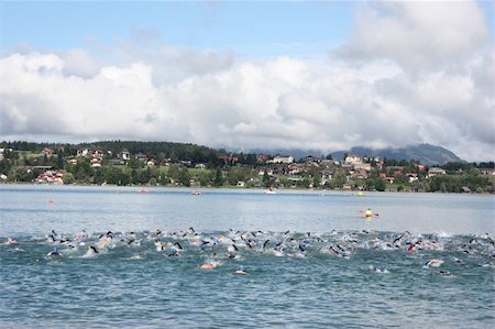 Swimming Start at the Triathlon at the Faaker See (28.08.2010) Stock Photo - Budget Royalty-Free & Subscription, Code: 400-05738136