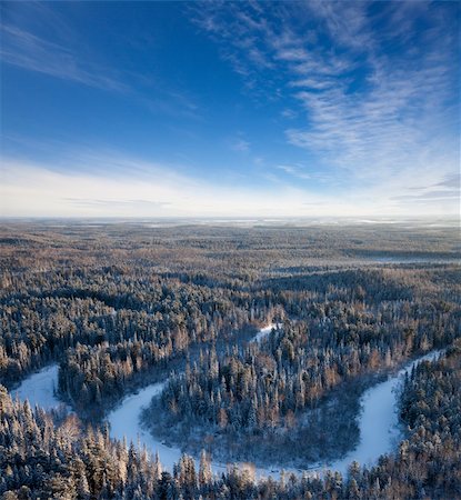 Aerial view of forest river in time of winter day. Fotografie stock - Microstock e Abbonamento, Codice: 400-05738435