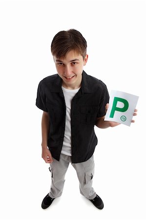 simsearch:400-05342933,k - A teenager holds the green magnetic provisional  P plates for vehicle.  White background. Foto de stock - Super Valor sin royalties y Suscripción, Código: 400-05738483