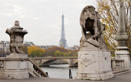 The Eiffel Tower as seen between statues of Alexandre III bridge, Paris Stock Photo - Budget Royalty-Free & Subscription, Code: 400-05738772