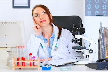simsearch:400-04925813,k - Female medical doctor sitting in cabinet and dreaming Stock Photo - Budget Royalty-Free & Subscription, Code: 400-05739346