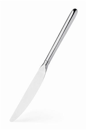simsearch:400-07323933,k - Silver knife stands vertically with shadow isolated on white Photographie de stock - Aubaine LD & Abonnement, Code: 400-05739413