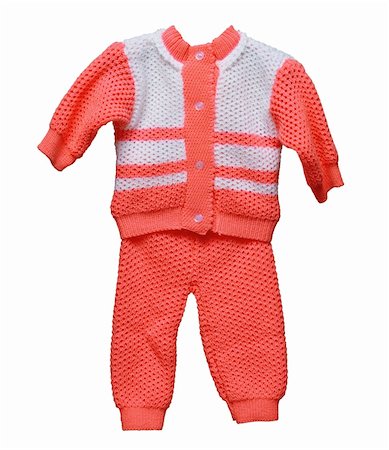 pink fabric fashion studio - Knitted wool overalls for baby isolated on white background Stock Photo - Budget Royalty-Free & Subscription, Code: 400-05739715