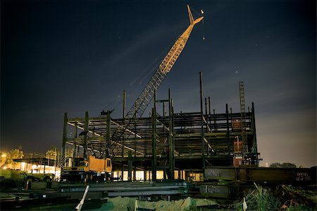 steel industry at night - Long exposure night shot on construction site with crane. No logos! Stock Photo - Budget Royalty-Free & Subscription, Code: 400-05730291