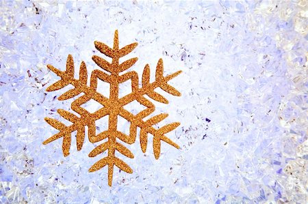 simsearch:400-05307881,k - Crhistmas snowflake golden star symbol over  ice background Stock Photo - Budget Royalty-Free & Subscription, Code: 400-05730413