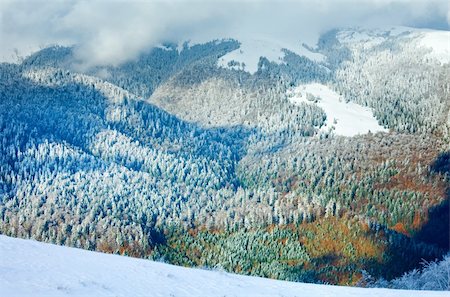 simsearch:400-05713513,k - October mountain view with first winter snow and last autumn colorful foliage on far mountainside Stock Photo - Budget Royalty-Free & Subscription, Code: 400-05730591