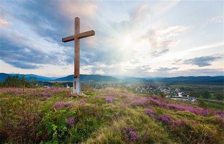 simsearch:400-04306537,k - Summer evening country foothills view with heather flowers and wooden cross on sky with sunshine background (Lviv Oblast, Ukraine) . Stock Photo - Budget Royalty-Free & Subscription, Code: 400-05731010