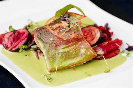 salmon pink - Smoked trout with vegetables on a plate Stock Photo - Budget Royalty-Free & Subscription, Code: 400-05731297