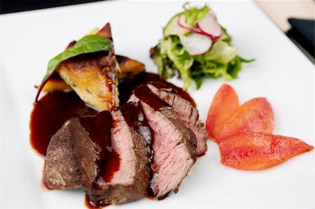 Beef fillet with potato gratin and fresh salad Stock Photo - Budget Royalty-Free & Subscription, Code: 400-05731300