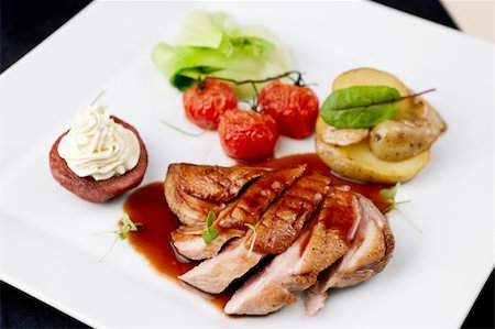 simsearch:400-05335169,k - Roasted duck with pear,marinated in red wine and mascarpone rose Stock Photo - Budget Royalty-Free & Subscription, Code: 400-05731301