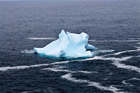 Melting iceberg off the coast of Newfoundland, Canada Stockbilder - Microstock & Abonnement, Bildnummer: 400-05731736