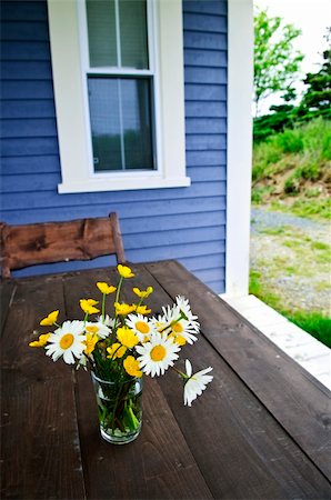 Bouquet of wildflowers on a rustic table at country cottage Stock Photo - Budget Royalty-Free & Subscription, Code: 400-05731733