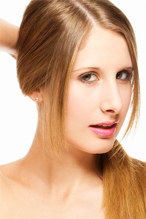 simsearch:400-05732399,k - beautiful woman holding her hair to a pigtail on white background Foto de stock - Super Valor sin royalties y Suscripción, Código: 400-05732402