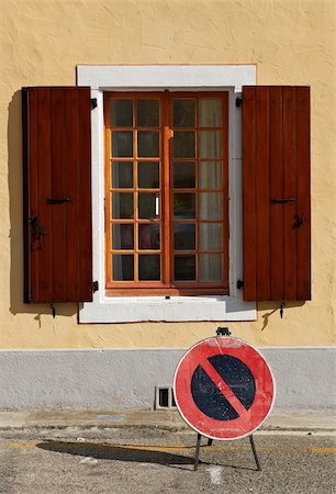 french stop sign in france - Traffic Sign Prohibiting Stopping near an Open Window in the Town of Saou, France Stock Photo - Budget Royalty-Free & Subscription, Code: 400-05732429