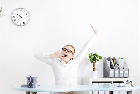 picture sleepy worker - Blonde caucasian businesswoman in glasses yawning in the office. Stock Photo - Budget Royalty-Free & Subscription, Code: 400-05732674