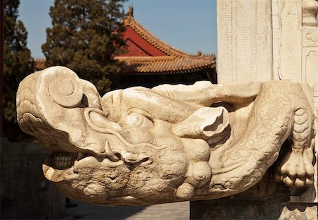 A traditional, ornamental stone carving of a crocodile at the Taimiao Ancestral Temple (now the People's Cultural Palace) in Beijing, China. Stock Photo - Budget Royalty-Free & Subscription, Code: 400-05732902