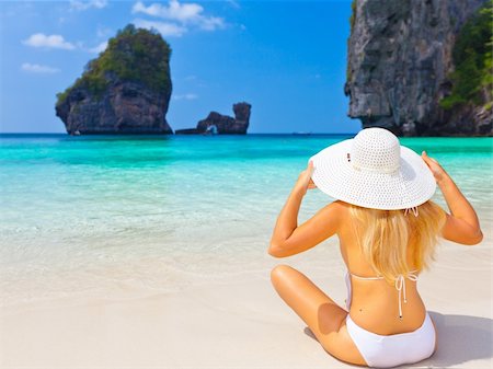 Beautiful woman on the beach. Phi phi island. Thailand Foto de stock - Super Valor sin royalties y Suscripción, Código: 400-05733435