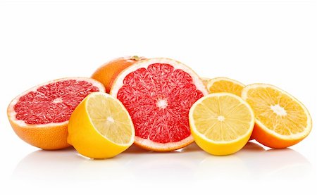 simsearch:400-04164071,k - fresh fruits orange lemon grapefruit in cut isolated on white background Stock Photo - Budget Royalty-Free & Subscription, Code: 400-05745223