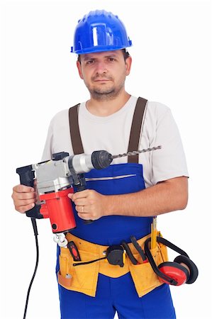 Confident worker portrait with power tool and safety equipment Stock Photo - Budget Royalty-Free & Subscription, Code: 400-05745261