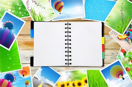 open notepad and streaming images on wood background Stock Photo - Budget Royalty-Free & Subscription, Code: 400-05745376