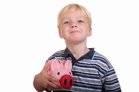 Portrait of a young boy holding his pink piggybank Stock Photo - Budget Royalty-Free & Subscription, Code: 400-05745938